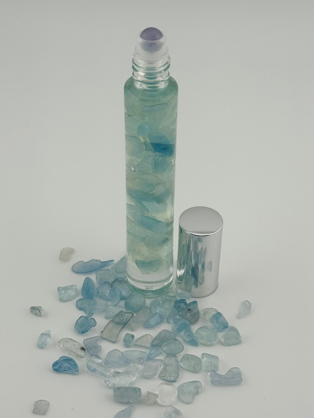 Marine Serenity - Aqua Marine Crystal Infused Cedarwood Roll-On (Throat Chakra)