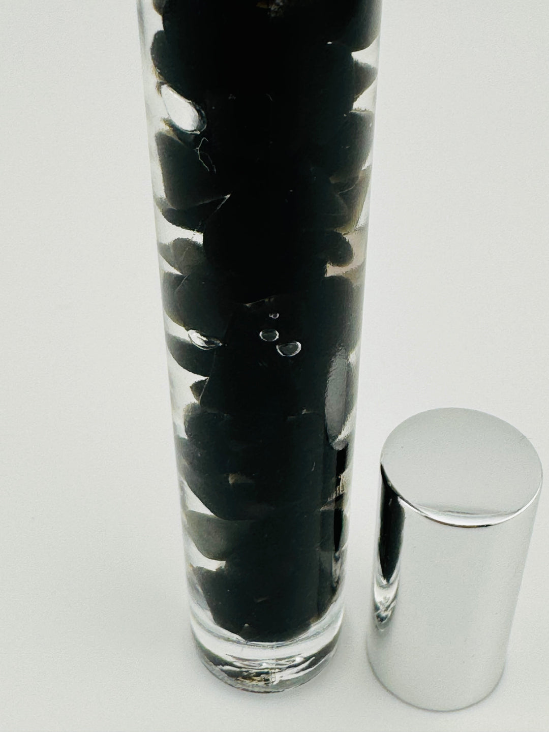 Black Obsidian Tranquility - Sandalwood Infused Crystal Roll-On (Root Chakra)