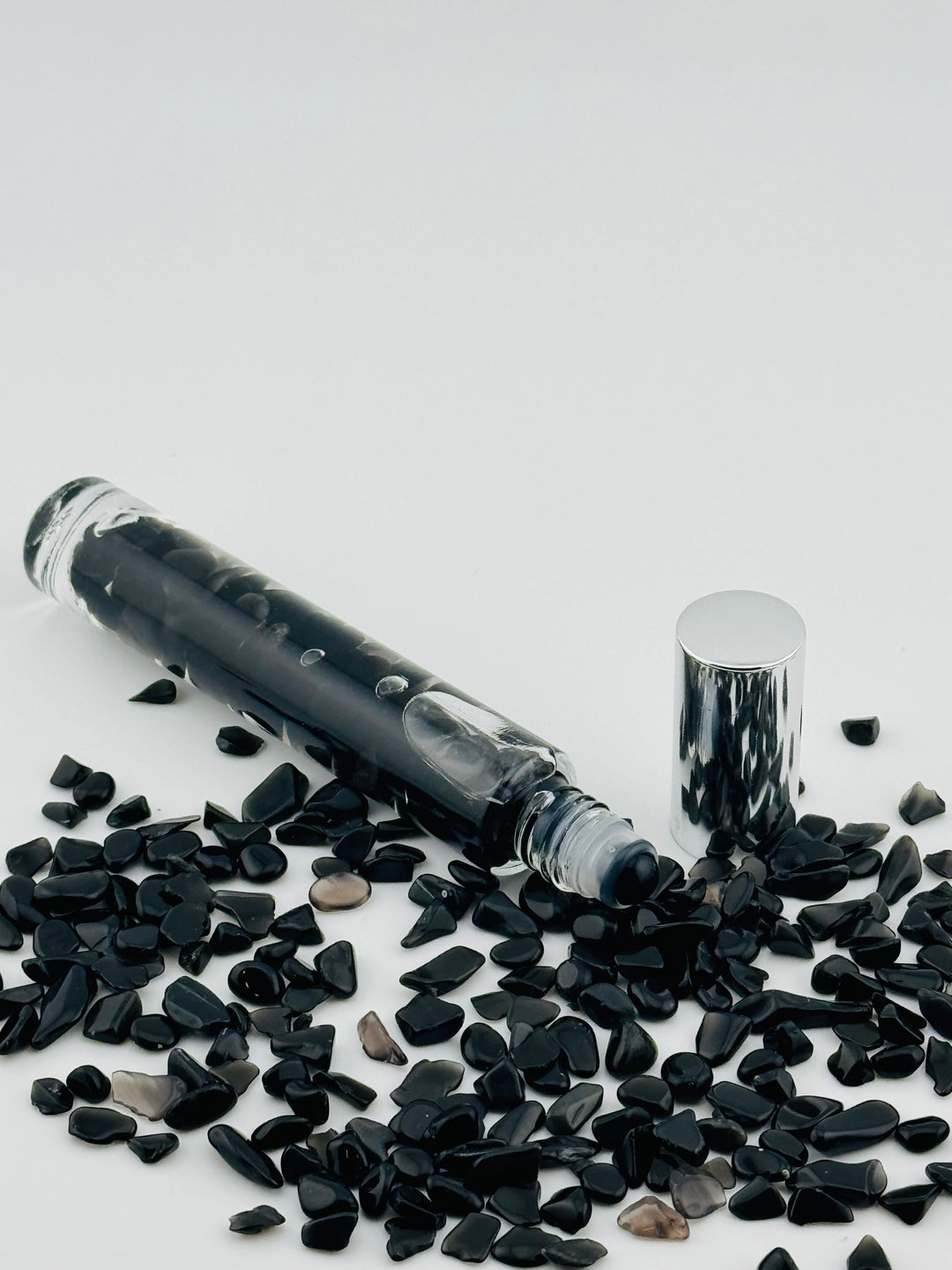 Black Obsidian Tranquility - Sandalwood Infused Crystal Roll-On (Root Chakra)