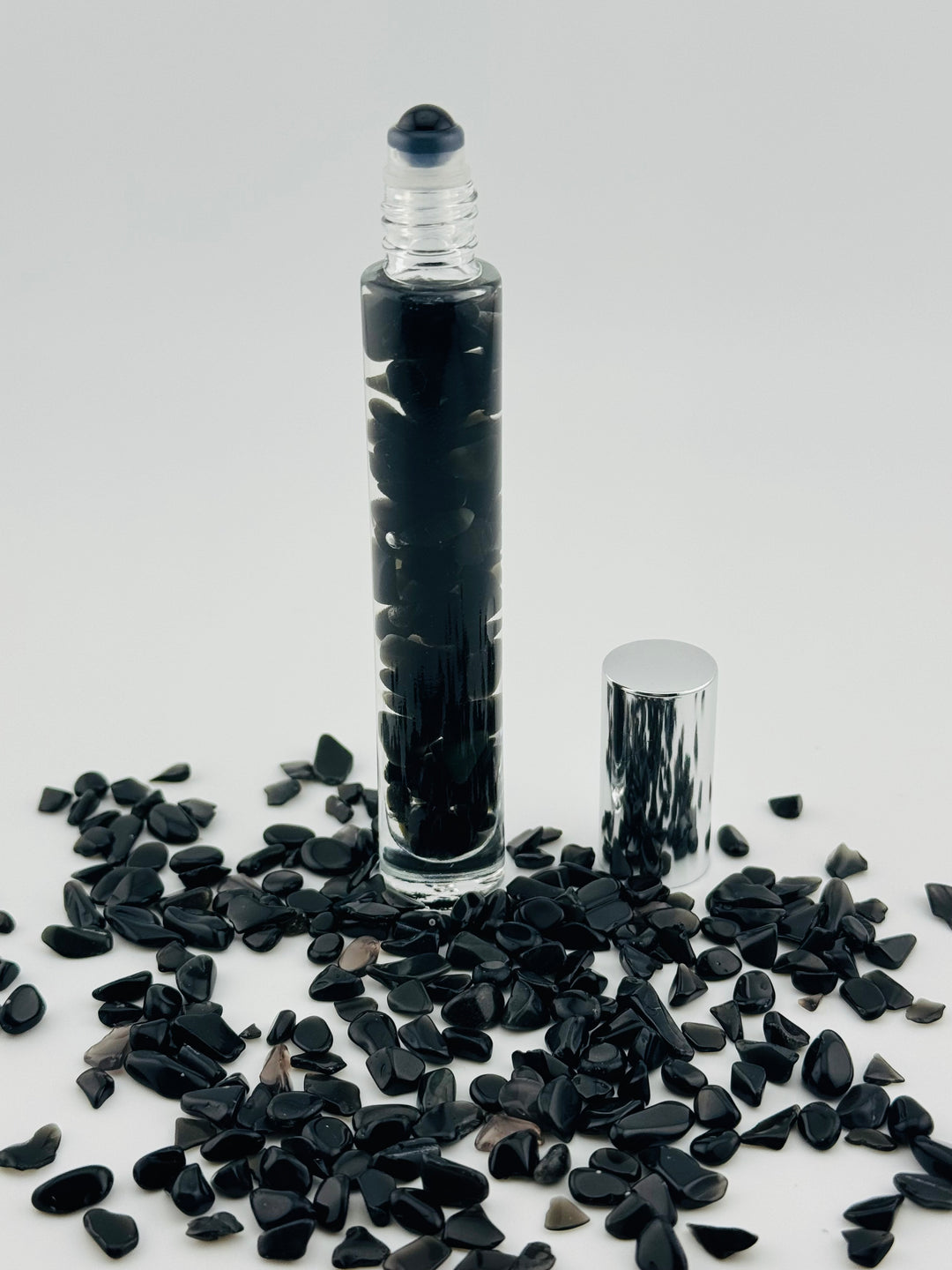 Black Obsidian Tranquility - Sandalwood Infused Crystal Roll-On (Root Chakra)