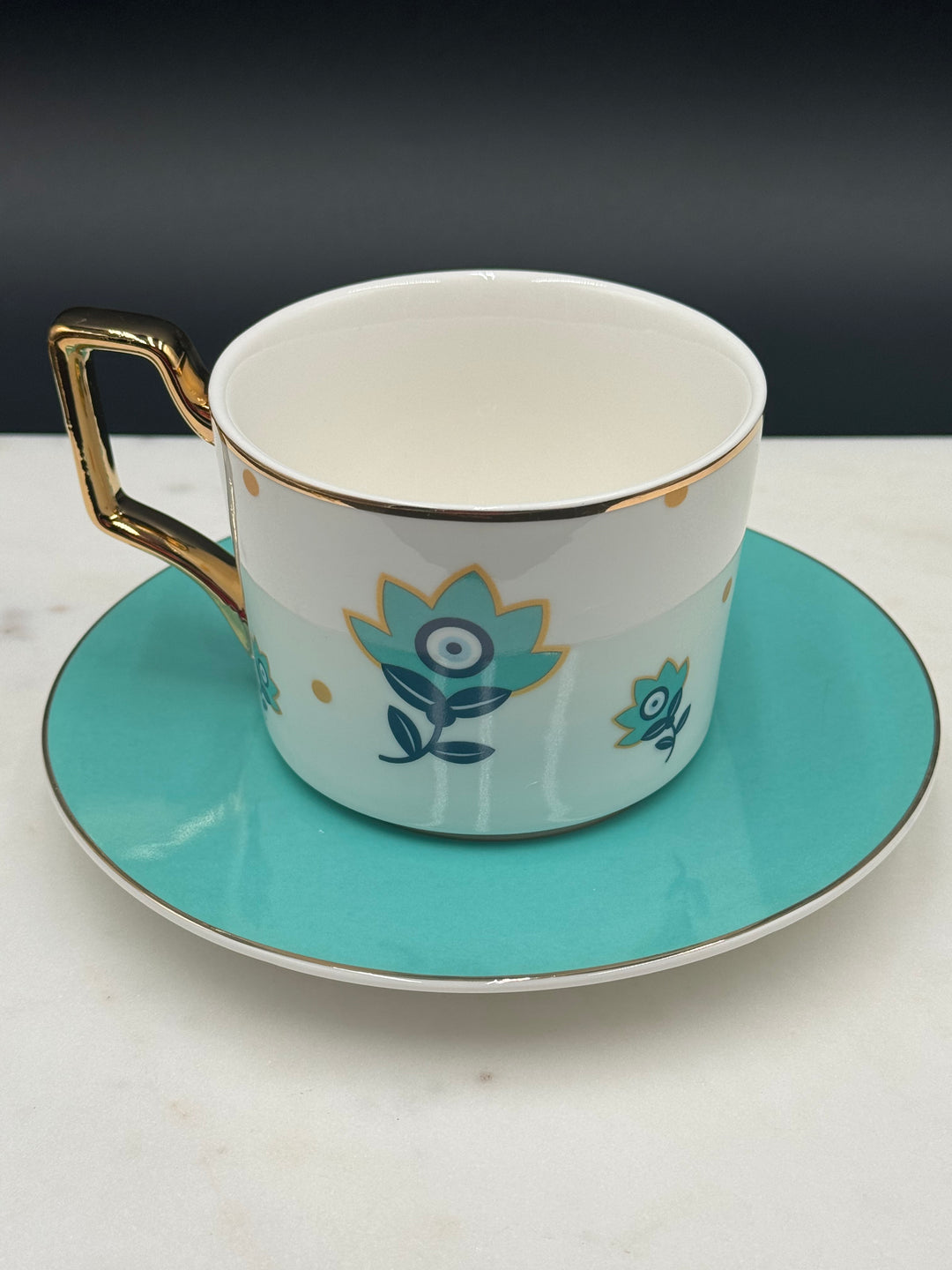 AuraGuard Luxe Ceramic Mug and Saucer Set